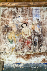 Fototapeta na wymiar frescoes on the walls of an abandoned Orthodox church