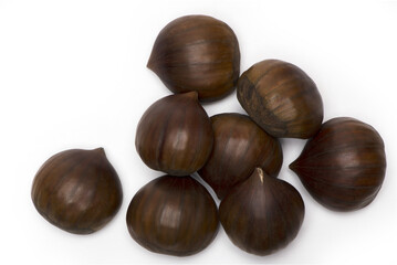 heap of eight chestnuts isolated white background