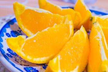Fototapeta na wymiar Fresh and delicious oranges served on a cute plate that is easy to eat 