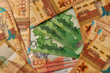 Tenge. Many tenge banknotes. Flat lay