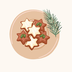 Christmas cookies on a plate decorated with spruce branch hand drawing. Winter holidays traditional treats.