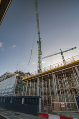 Dublin Docklands in pandemium covid-19, Ireland, Sir John Rogerson's Quay, construction works in Docklands, construction cranes,