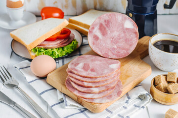 Breakfast with ham, coffee, egg and sandwich