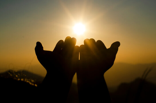 Hands of human are pray and worship on sky sunset background, Soul of prayer man, Spirituality with believe and religion