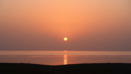 Dawn of the sun over the red sea.