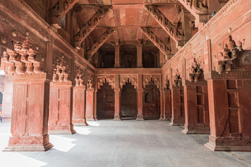 Agra Fort royal palace interior architecture with intricate wall artwork and carvings. Agra Fort is...
