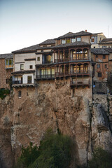 Fototapeta na wymiar A view of the medieval hanging houses built on the edge of the cliff, in the city of Cuenca, Spain.