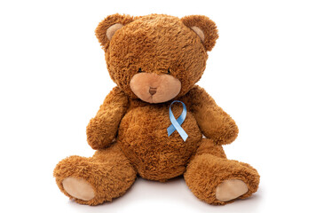 medicine, healthcare and oncology concept - teddy bear toy with blue prostate cancer awareness ribbon on white background