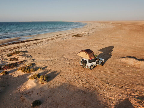 Mauritania, Banc DArguin National Park, Aerial View Of Off Road Car With Rooftop Tent On Desert