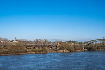 Fototapeta na wymiar View to the old railway bridge over the Main near Hochheim am Main / Germany in spring