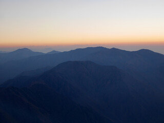 Naklejka na ściany i meble Amazing view from the top of Djebel Toubkal, North Africa's highest mountain, at sunrise. Morocco.