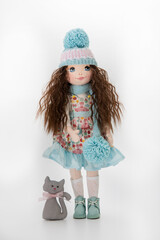 Girl with a doll, A girl in a dress and a cat, child's play.