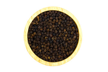 Black pepper on wooden bowl isolated on white background, top view.