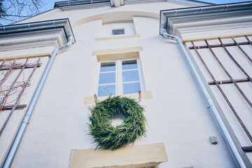 Door of house with Christmas wreath