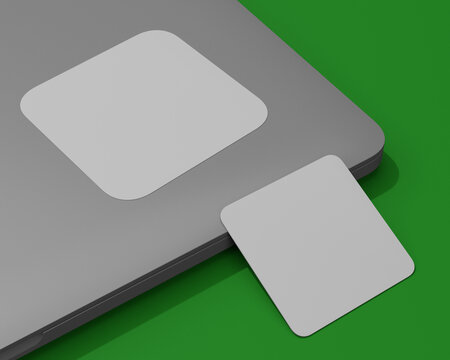 3d Render Of A Mockup Of A Square Sticker On A Laptop Plus Square Business Card On A Green Chromakey Background For Easy Background Color Change