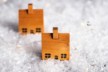 Christmas background with wooden houses in snow
