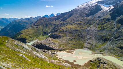 Grossglockner national park aerial view in summer season with detail on glacier lake.