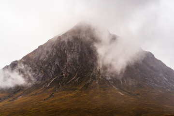 Glencoe mountain covered in mist in the Scottish countryside