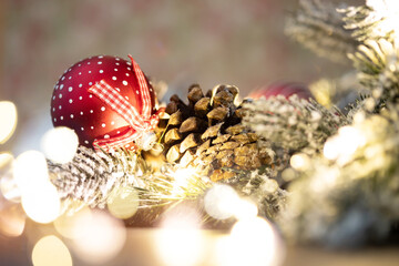 Christmas decorations with red ball in magic light.