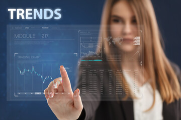 Business, Technology, Internet and network concept. Young businessman working on a virtual screen of the future and sees the inscription: Trends