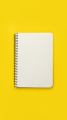 Open spiral notebook with blank empty white sheets and binder on bright yellow background, top view, flat lay