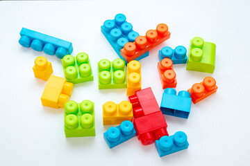 Bright building toy blocks. Educational toys for children. Close-up. View from above