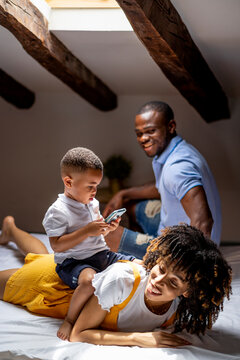 Family enjoying leisure time together at home