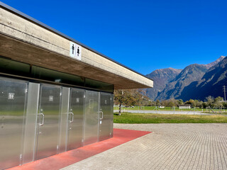 Restrooms at rest area on Swiss highway.