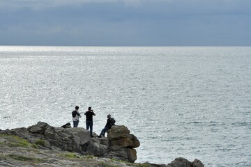Fototapeta na wymiar People watching the sea on the Quiberon peninsula coast in Brittany - France
