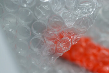 detailes close up view on bubble wrap, transparent plastic packaging