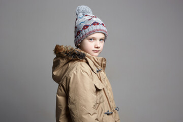 Fashionable Boy in winter outerwear. fashion kid © eugenepartyzan