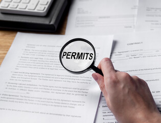 Permits word through magnifying glass over permissions and approved documents.