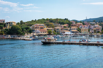 Fototapeta na wymiar View of the port of Kassiopi on the island of Corfu (Greece) from the opposite shore of the bay