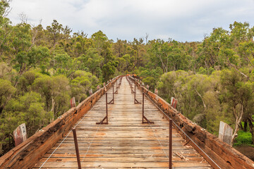 Bibbulmun Track, Long Gully Bridge, Lower Hotham, Western Australia, Australia, 12 december 2011: Historic bridge over the Murray River destroyed by Lower Hotham forest fire February 2015