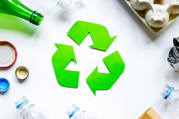 environment concept with recycling symbol on white background top view