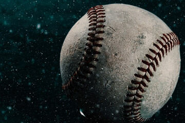 Baseball in winter snow background for sport with shallow depth of field