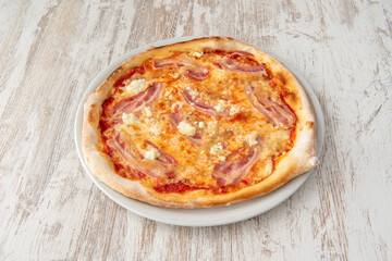 great italian formaggio and guanciale pizza cooked in a stone oven