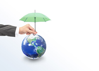 Protect our World for Future Friendly World Sustainable Environment Natural Day and Save our Earth Concept, Hand holding light green umbrella over globe earth, Elements of this image furnished by NASA