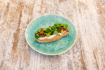 pulled pork cheek dog with lots of coriander and village bread