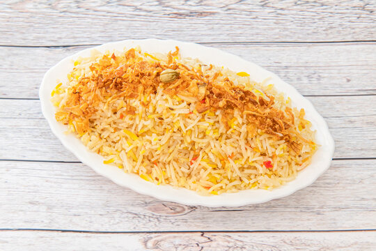 Pilaf, pulaw or pulau is a traditional way of cooking rice, with vegetables, lamb or beef, chicken or sometimes fish, and with spicy seasonings.