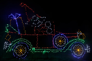 Elf in classic car light up at the Fantasy of Lights in Los Gatos, California.
