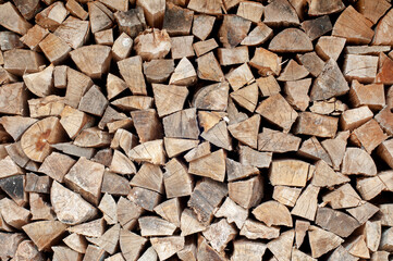 Pile of a dry chopped firewood logs