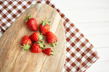 fresh strawberries on wooden board fruit vitamins summer