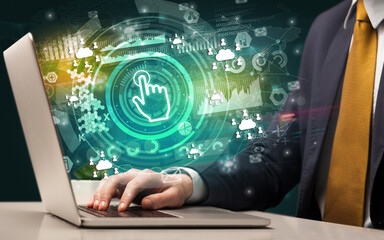 Business hand typing on a modern laptop