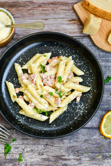  Fresh home made italian  penne  pasta   alla carbonara with  cream sauce  ,  bacon,egg, parmesan cheese ,olive oil and black pepper) 