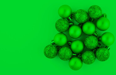 Beautiful deco Christmas decorations on a green background. Flat design. Copy space. Horizontally.