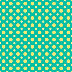 Polka Dots pattern in yellow spots on light green background. Yellow dots on green.