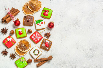 Christmas gingerbread cookies with holidays decorations. Creative handmade present for christmas holidays. Top view image.
