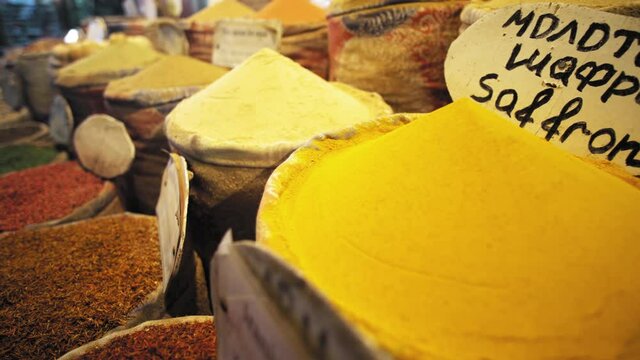 Spices in traditional egyptian market, bazaar. Colorfull and oriental shop with herbs