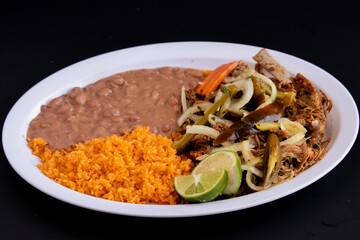 Barbacoa platter with rice and beans (goat meat)
